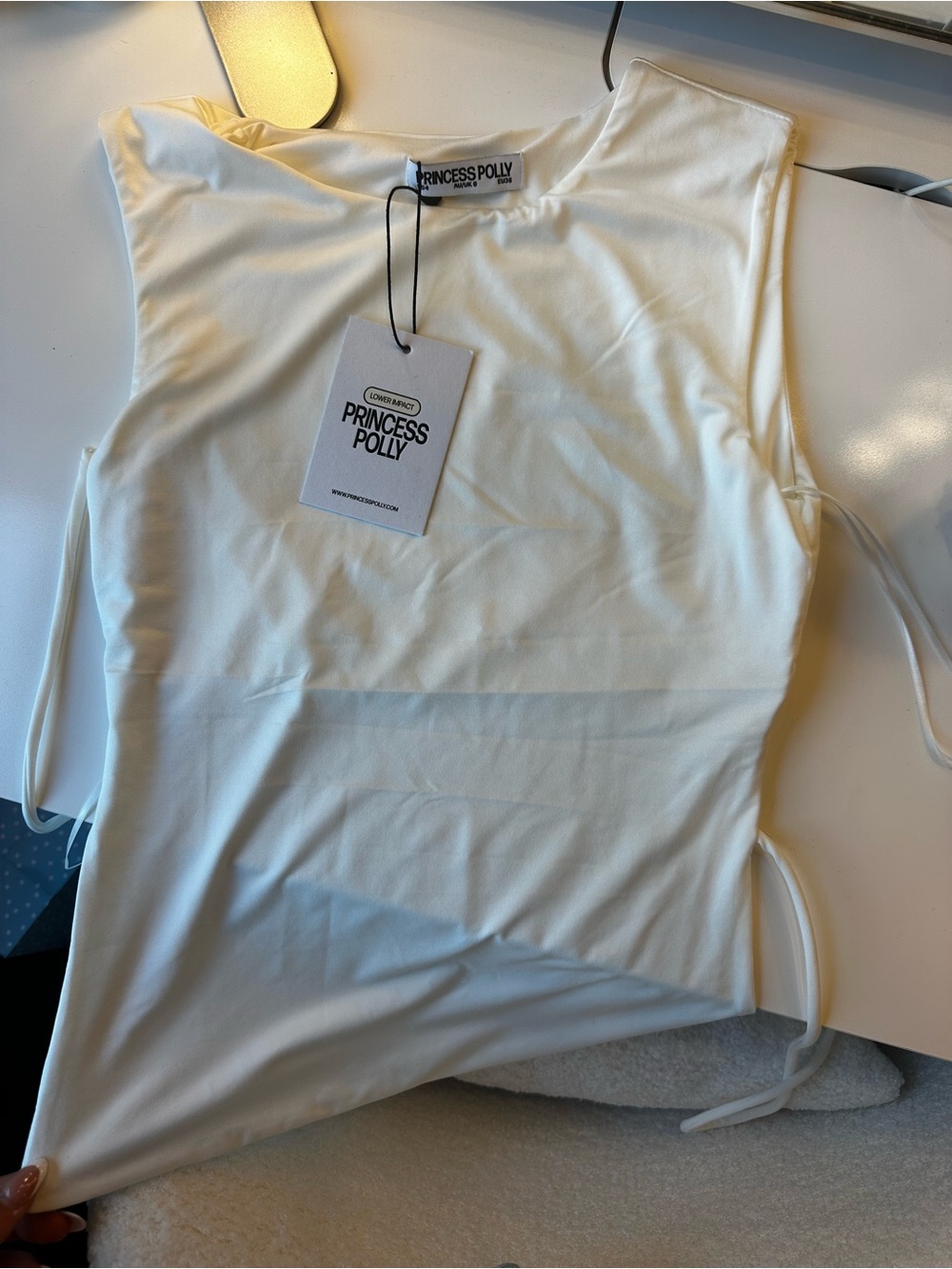 Uzo Top White Lower Impact